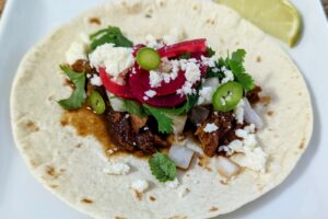 Slow Cooker Pulled Pork Tacos Plated