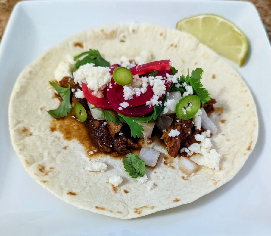 Slow Cooker Pulled Pork Tacos Plated