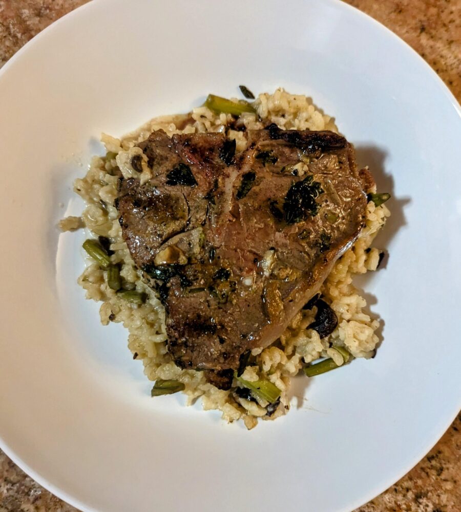 Grilled Lamb Chops Plated Over Risotto